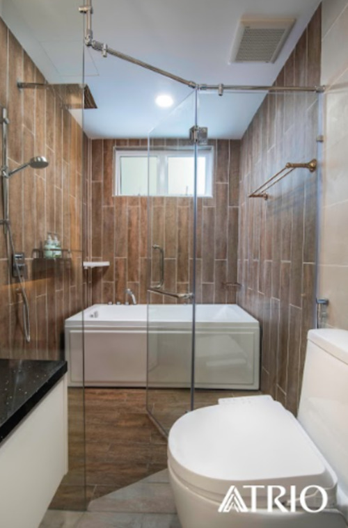 Bathroom design based on drain positioning, waterproofing scope, and wall-hung fixture