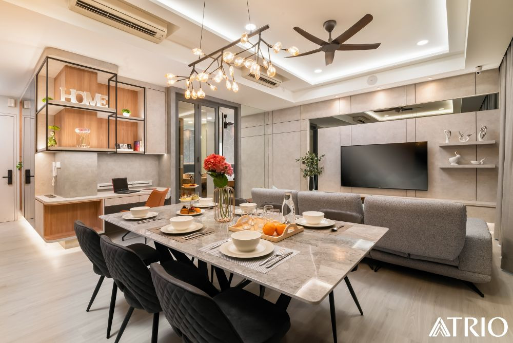 A Trio Design living area with seamless wall panelling and dining space
